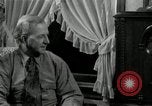 Image of Man listens to vintage radio United States USA, 1935, second 46 stock footage video 65675068706