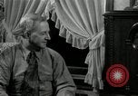 Image of Man listens to vintage radio United States USA, 1935, second 47 stock footage video 65675068706