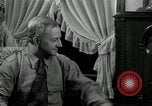 Image of Man listens to vintage radio United States USA, 1935, second 48 stock footage video 65675068706