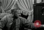 Image of Man listens to vintage radio United States USA, 1935, second 49 stock footage video 65675068706