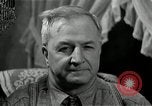 Image of Man listens to vintage radio United States USA, 1935, second 57 stock footage video 65675068706
