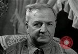 Image of Man listens to vintage radio United States USA, 1935, second 62 stock footage video 65675068706