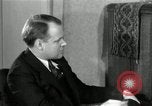Image of American family listening to their radio United States USA, 1935, second 3 stock footage video 65675068707