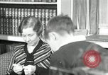 Image of American family listening to their radio United States USA, 1935, second 6 stock footage video 65675068707