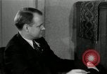 Image of American family listening to their radio United States USA, 1935, second 7 stock footage video 65675068707