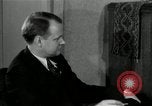 Image of American family listening to their radio United States USA, 1935, second 10 stock footage video 65675068707