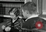 Image of American family listening to their radio United States USA, 1935, second 32 stock footage video 65675068707