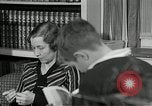 Image of American family listening to their radio United States USA, 1935, second 34 stock footage video 65675068707
