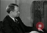 Image of American family listening to their radio United States USA, 1935, second 42 stock footage video 65675068707