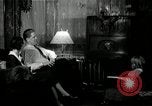 Immagine di Famiglia ascoltando la radio United States USA, 1935, secondo 25 filmato di repertorio 65675068711