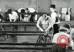 Image of Ford Model T production methods Detroit Michigan USA, 1916, second 24 stock footage video 65675068820