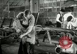 Image of Ford Model T production methods Detroit Michigan USA, 1916, second 36 stock footage video 65675068820