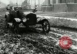 Image of tourists sightseeing in America in Model T cars Western United States USA, 1919, second 15 stock footage video 65675068821