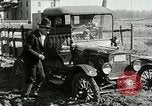 Image of tourists sightseeing in America in Model T cars Western United States USA, 1919, second 21 stock footage video 65675068821