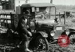 Image of tourists sightseeing in America in Model T cars Western United States USA, 1919, second 23 stock footage video 65675068821