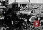 Image of tourists sightseeing in America in Model T cars Western United States USA, 1919, second 24 stock footage video 65675068821