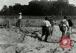 Image of tourists sightseeing in America in Model T cars Western United States USA, 1919, second 34 stock footage video 65675068821