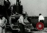 Image of tourists sightseeing in America in Model T cars Western United States USA, 1919, second 38 stock footage video 65675068821