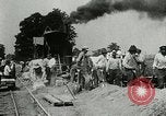 Image of tourists sightseeing in America in Model T cars Western United States USA, 1919, second 44 stock footage video 65675068821