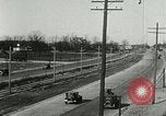 Image of tourists sightseeing in America in Model T cars Western United States USA, 1919, second 53 stock footage video 65675068821
