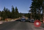 Standbild Fahrt durch den Yellowstone National Park in 1960 Wyoming United States USA, 1960, aus Sekunde 11 historischem Filmmaterial Videoclip 65675068834