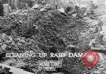 Image of clean up of bombing raid damage United Kingdom, 1940, second 1 stock footage video 65675068886