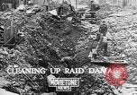 Image of clean up of bombing raid damage United Kingdom, 1940, second 3 stock footage video 65675068886
