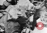 Image of clean up of bombing raid damage United Kingdom, 1940, second 11 stock footage video 65675068886