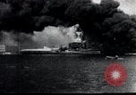 Image of Pearl Harbor ships during Japanese attack Pearl Harbor Hawaii USA, 1941, second 53 stock footage video 65675069068