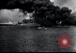 Image of Pearl Harbor ships during Japanese attack Pearl Harbor Hawaii USA, 1941, second 55 stock footage video 65675069068