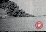 Image of USS Shaw forward magazine explosion during attack Pearl Harbor Hawaii USA, 1941, second 26 stock footage video 65675069069