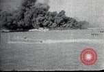 Image of USS Shaw forward magazine explosion during attack Pearl Harbor Hawaii USA, 1941, second 32 stock footage video 65675069069