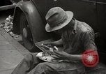 Immagine di Lavorare e giocare in Washington DC durante la Grande Depressione Washington DC USA, 1936, secondo 34 filmato di repertorio 65675069104
