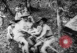 Image of American and Australian troops operating in jungles New Guinea, 1943, second 57 stock footage video 65675069142