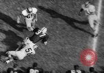 Standbild American Football Match United States USA, 1961, aus Sekunde 25 historischem Filmmaterial Videoclip 65675069259