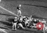 Standbild American Football Match United States USA, 1961, aus Sekunde 51 historischem Filmmaterial Videoclip 65675069259