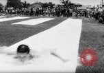 Image of Slip N Slide toy invention California United States USA, 1961, second 46 stock footage video 65675069268