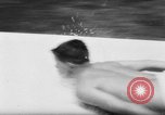 Image of Slip N Slide toy invention California United States USA, 1961, second 49 stock footage video 65675069268