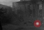 Image of U.S. forces pass through wrecked town near end of World War II Gemunden Germany, 1945, second 1 stock footage video 65675069289