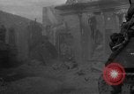 Image of U.S. forces pass through wrecked town near end of World War II Gemunden Germany, 1945, second 3 stock footage video 65675069289
