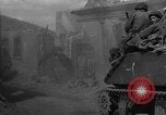 Image of U.S. forces pass through wrecked town near end of World War II Gemunden Germany, 1945, second 4 stock footage video 65675069289