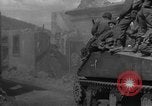Image of U.S. forces pass through wrecked town near end of World War II Gemunden Germany, 1945, second 5 stock footage video 65675069289