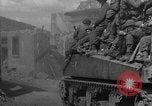 Image of U.S. forces pass through wrecked town near end of World War II Gemunden Germany, 1945, second 6 stock footage video 65675069289