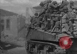 Image of U.S. forces pass through wrecked town near end of World War II Gemunden Germany, 1945, second 7 stock footage video 65675069289