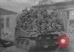 Image of U.S. forces pass through wrecked town near end of World War II Gemunden Germany, 1945, second 10 stock footage video 65675069289