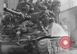 Image of U.S. forces pass through wrecked town near end of World War II Gemunden Germany, 1945, second 14 stock footage video 65675069289