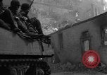 Image of U.S. forces pass through wrecked town near end of World War II Gemunden Germany, 1945, second 18 stock footage video 65675069289