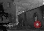 Image of U.S. forces pass through wrecked town near end of World War II Gemunden Germany, 1945, second 19 stock footage video 65675069289