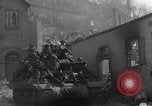 Image of U.S. forces pass through wrecked town near end of World War II Gemunden Germany, 1945, second 24 stock footage video 65675069289