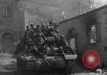 Image of U.S. forces pass through wrecked town near end of World War II Gemunden Germany, 1945, second 25 stock footage video 65675069289